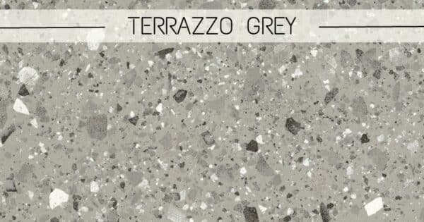 céramique effet Terrazzo avec un fond gris et des éléments blanc, gris et noir