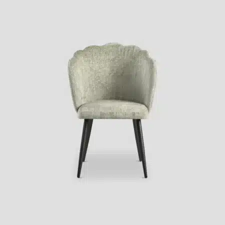 chaise de salle à manger confortable avec dossier arrondi au design original, tissu vert moderne légèrement gaufré.